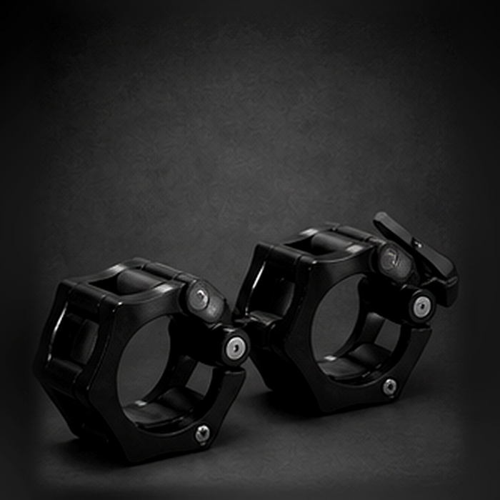 Holtmark Fitness Barbell Collars premium product image on dark studio background