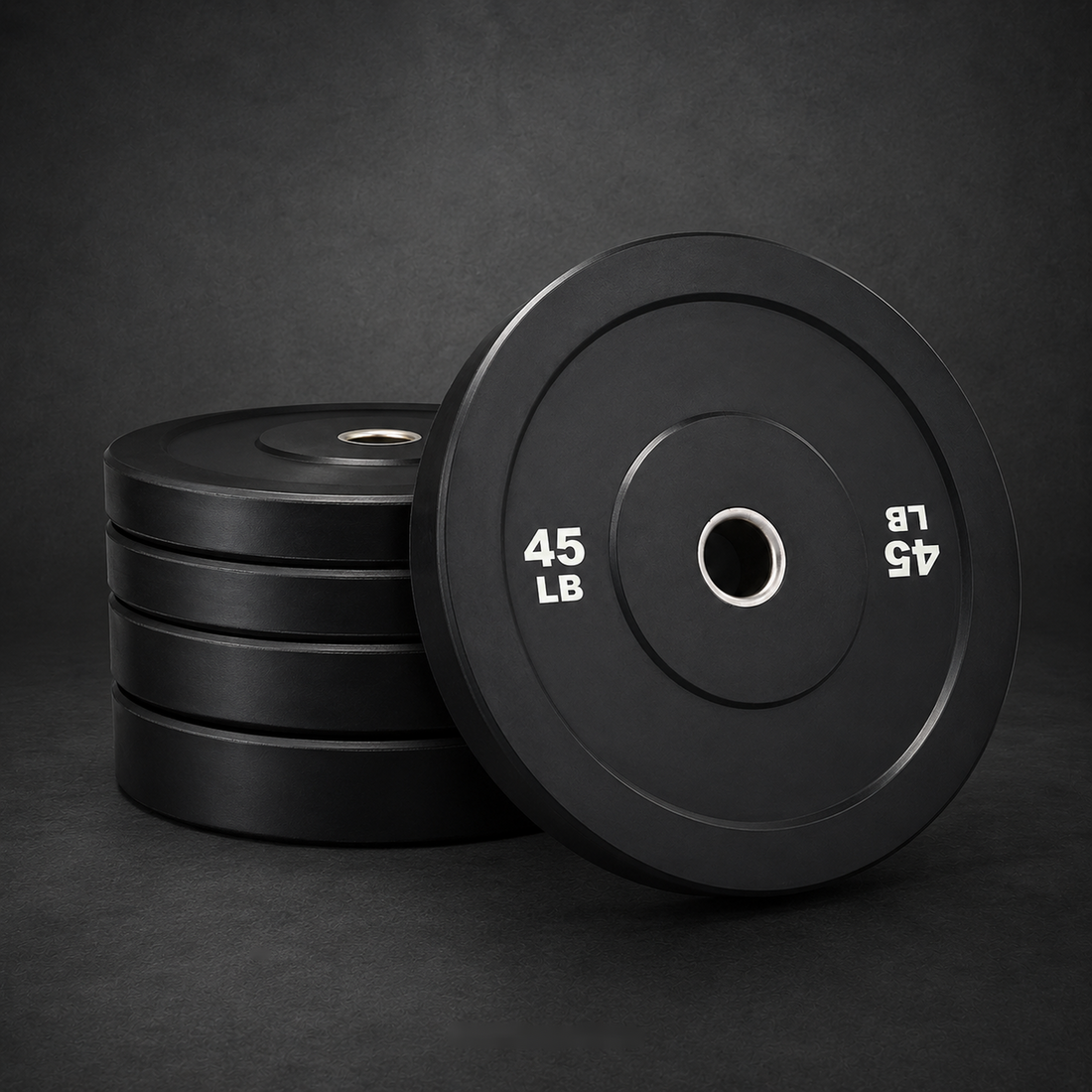 Holtmark Fitness Black Bumper Plates product image on dark studio background